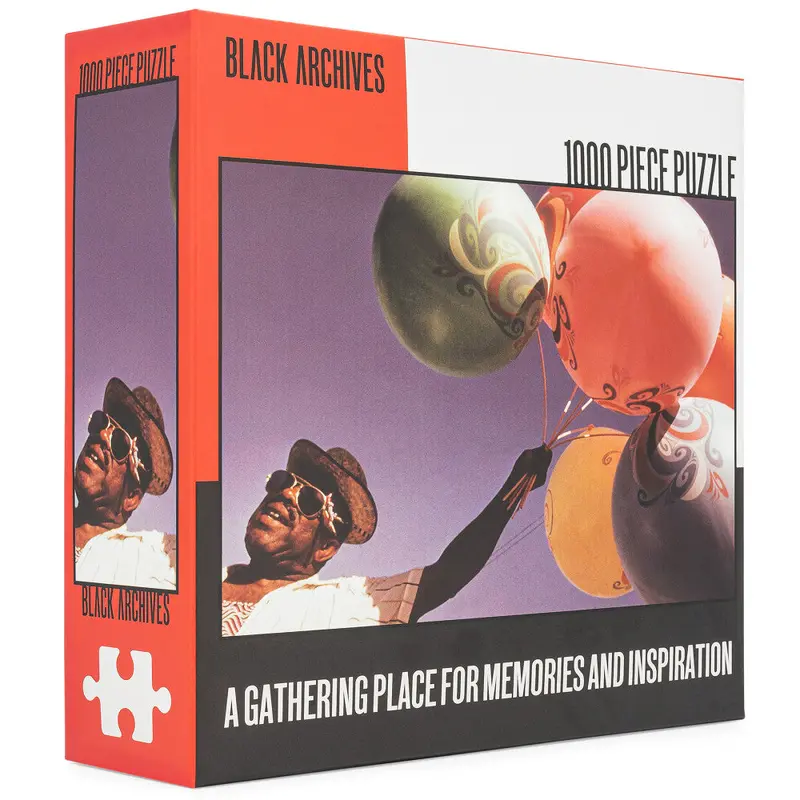 Man With Balloons Jigsaw Puzzle – 1000-Piece Artistic Challenge from Black Archives